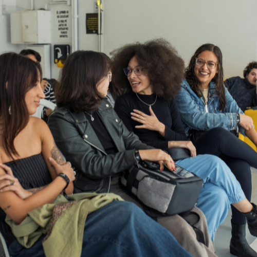 women gathered talking