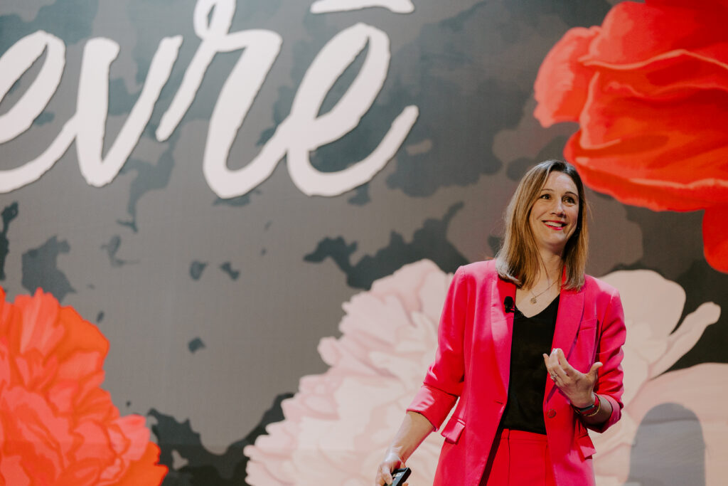 Dr. Rebecca Heiss speaking at a leadership conference